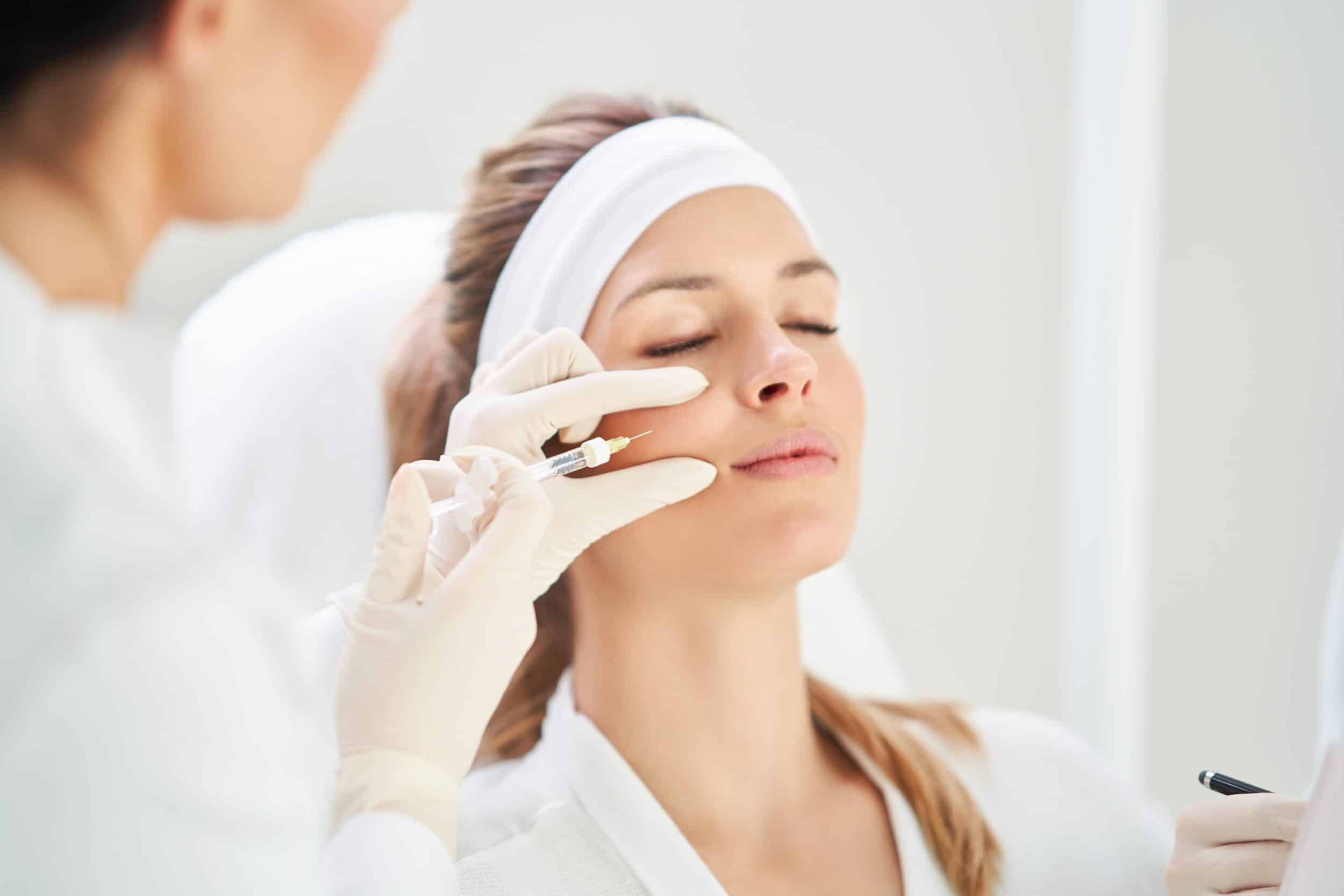 Woman receiving a PRF (Platelet-Rich Fibrin) injection, enhancing skin rejuvenation and promoting natural healing for a youthful appearance